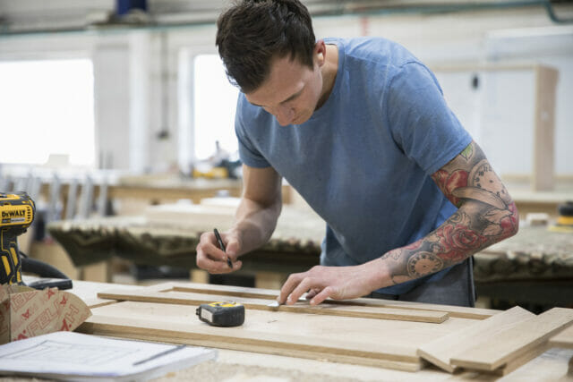 Handmade kitchen cabinetry being crafted at Higham Furniture’s Denmead workshop using traditional joinery techniques