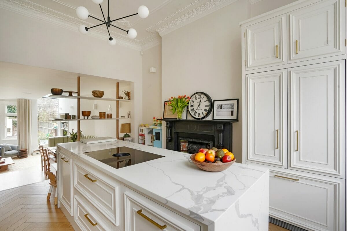 Highbury London panel and moulding painted kitchen with Fisher and Paykel built in fridge.