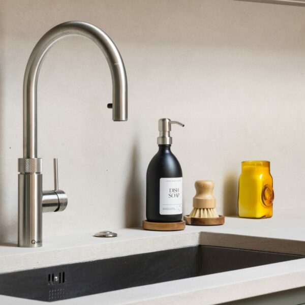 Shaker kitchen with large stainless steel sink and a stainless steel Quooker boiling water tap.