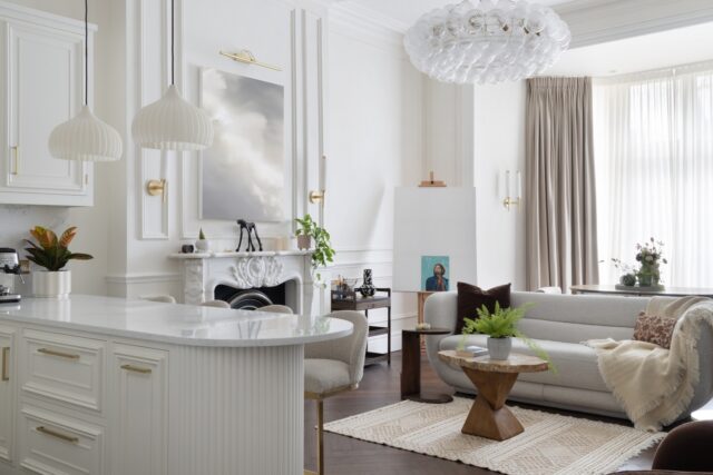 Luxury open-plan bespoke kitchen and living space with handcrafted cabinetry in a London home
