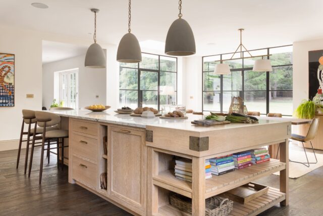 Handmade oak kitchen island with storage in a bespoke kitchen designed and built in the UK