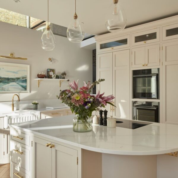 Herne Hill Shaker Kitchen island with curved end for bar stools, a Bora hob and a Shaws Belfast sink.